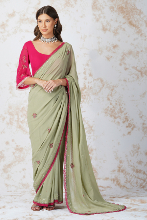 Beaded flower saree with contrast blouse