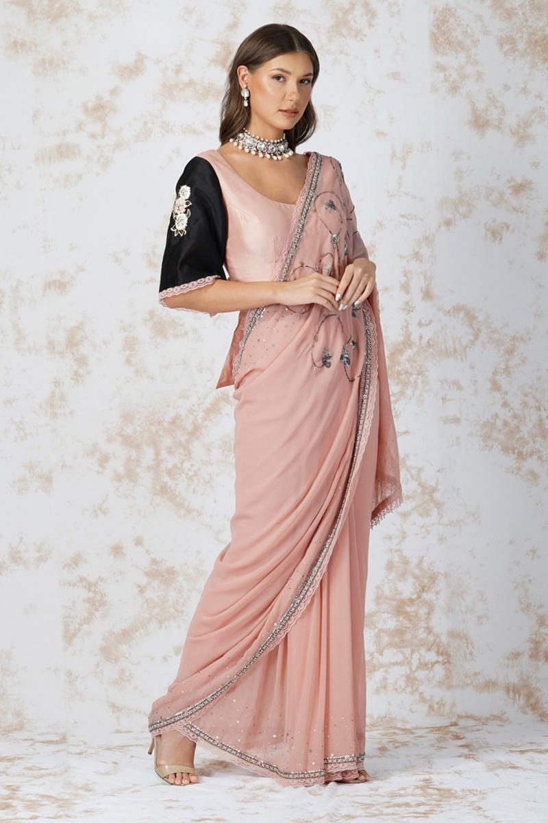 Antique work saree with contrast blouse
