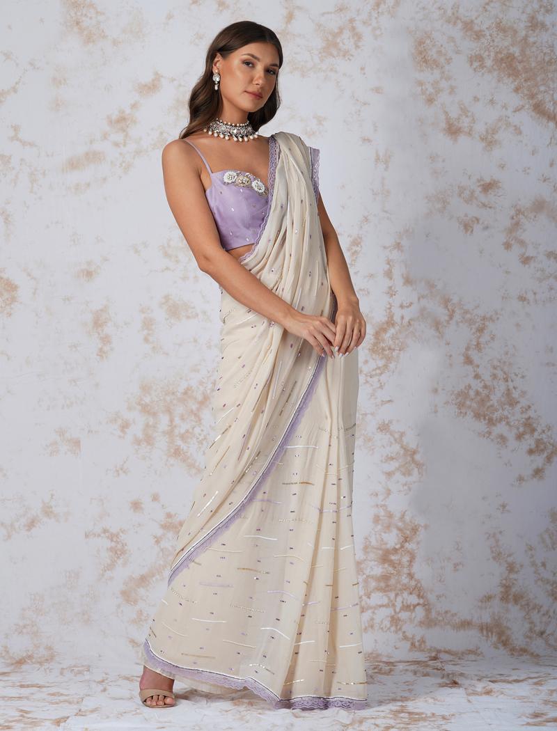 Sequined saree with contrast blouse