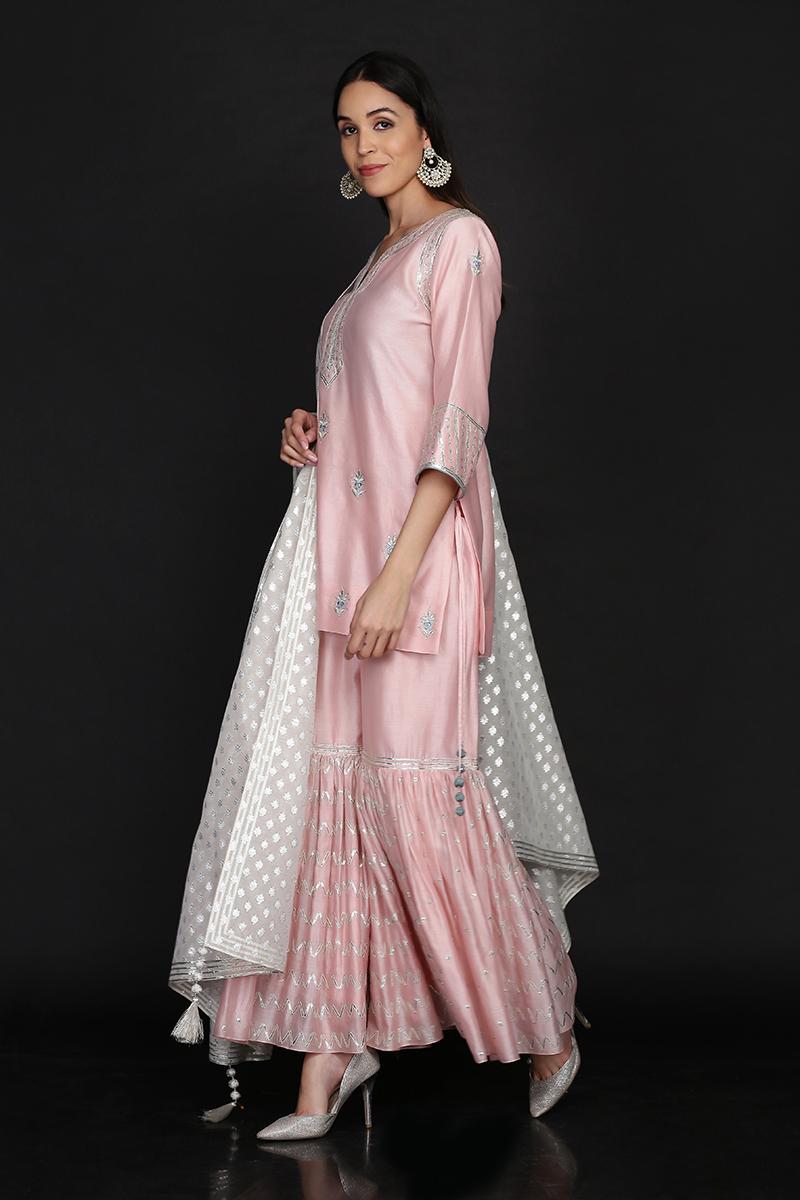 Baby pink assymetrical tunic with sharara and ruffle dupatta