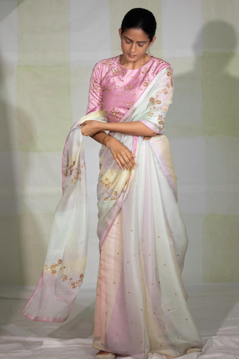 Multi coloured hand embroidered saree with pink blouse