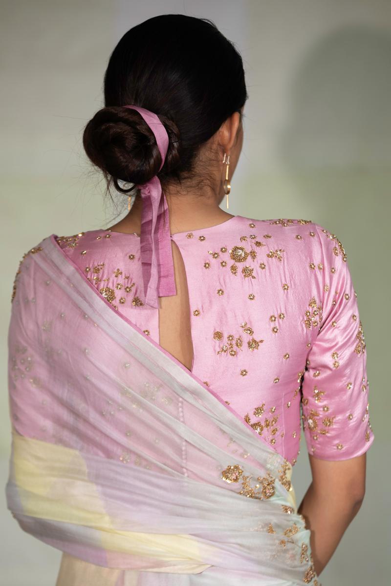 Multi coloured hand embroidered saree with pink blouse