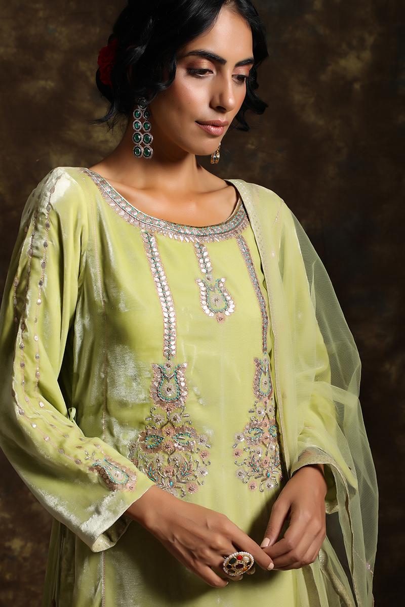  Pista velvet Kurta and having a net Dupatta with embroidery details with brocade jama