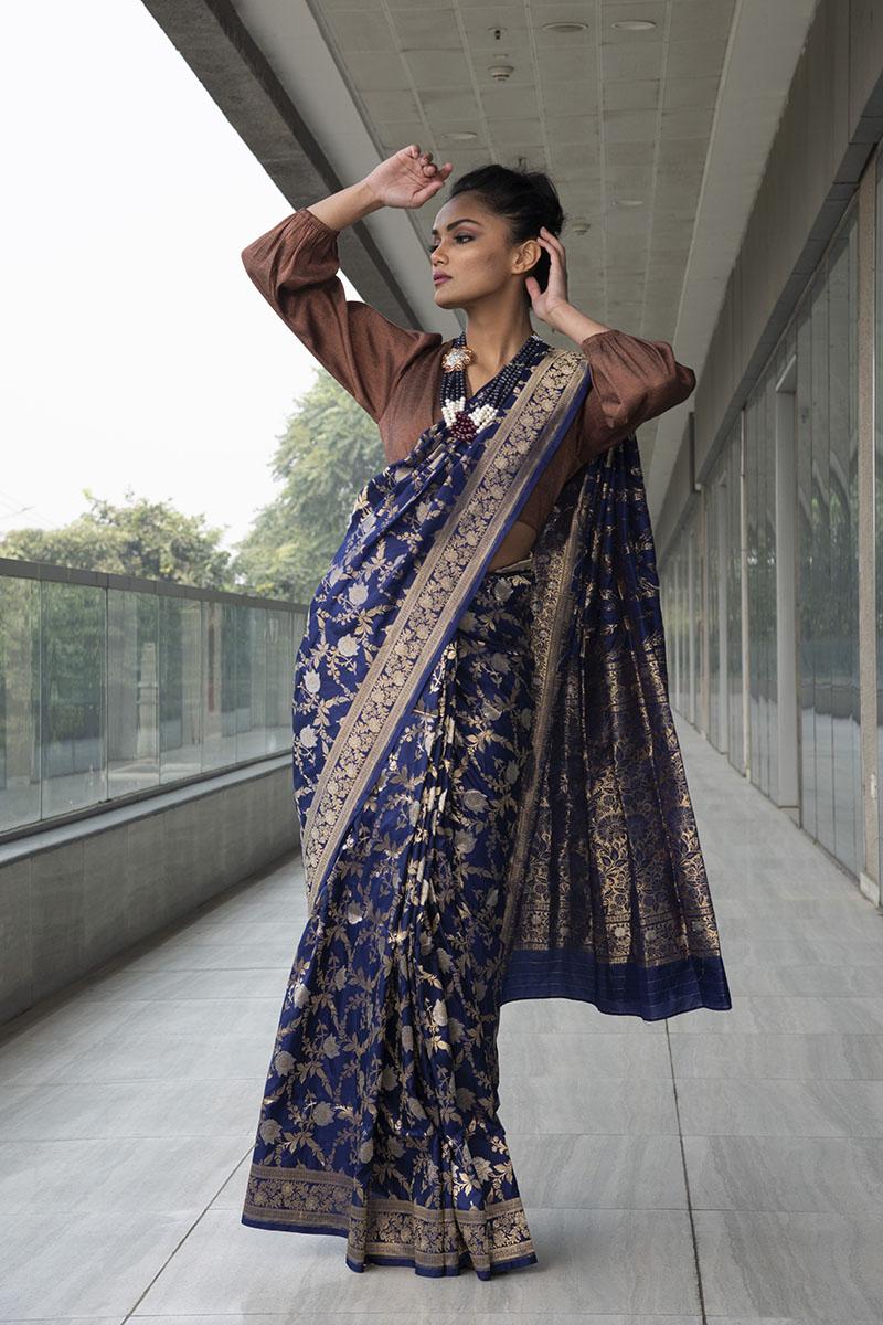  blue pure katan silk saree with tissue blouse.