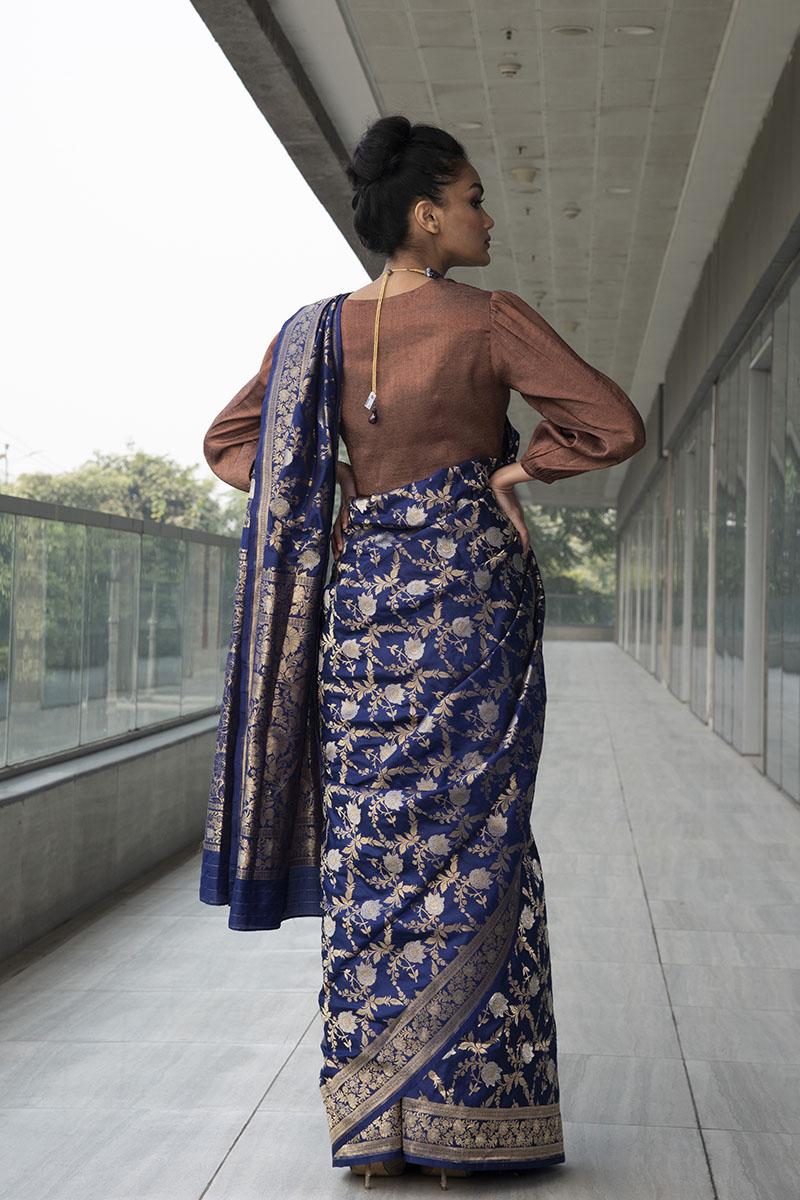  blue pure katan silk saree with tissue blouse.
